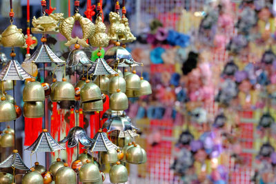 Close-up of lanterns hanging for sale at market stall