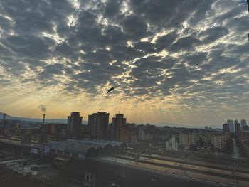 High angle view of buildings against sky during sunset