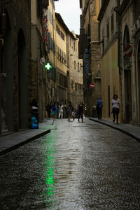 People walking on street in city