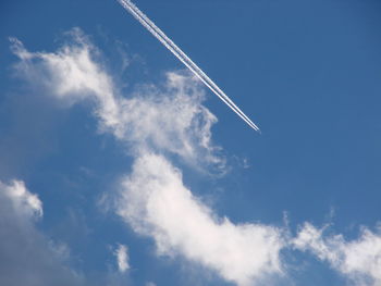 Low angle view of vapor trail in sky