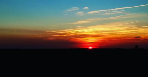 Scenic view of silhouette landscape against sky during sunset