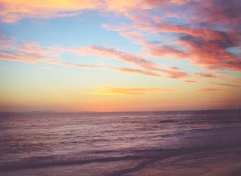 Scenic view of sea at sunset