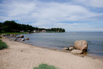 Scenic view of beach against sky