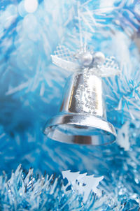 Close-up of bell hanging on christmas decoration