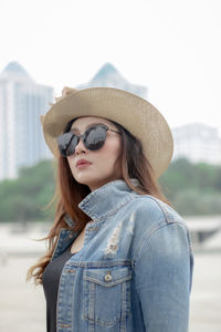 Young woman wearing hat