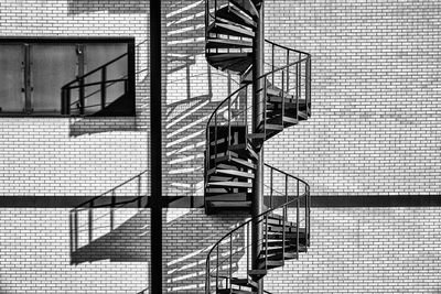 Spiral staircase by building
