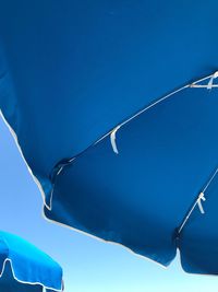 Low angle view of beach umbrella