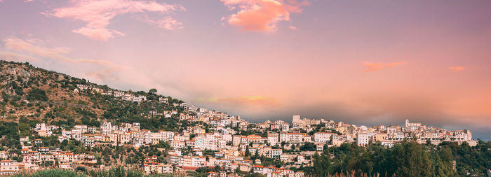 Panoramic view of townscape against sky during sunset