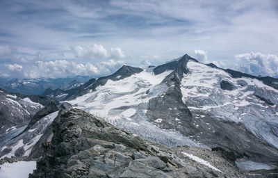 Scenic view of snowcapped mountains against sky