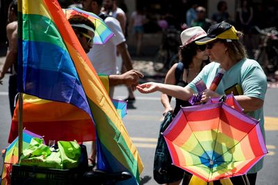 People on multi colored umbrellas