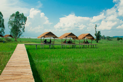 House on field against sky