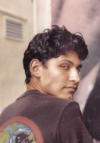 Portrait of young man looking away