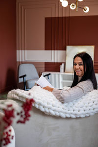 Young woman sleeping on bed at home