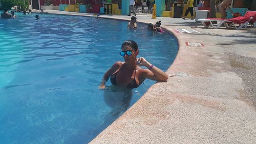 Portrait of woman in swimming pool