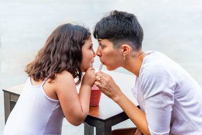 Side view of couple kissing