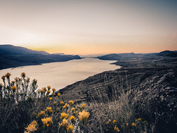 Scenic view of mountains against sky during sunset