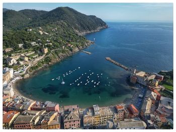 High angle view of townscape by sea