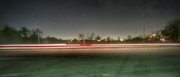 Light trails on road at night