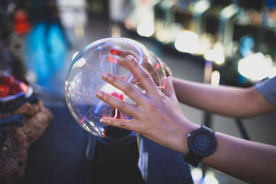 Close-up of hand holding bubbles