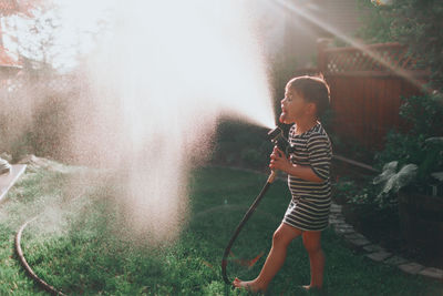 Girl standing in water