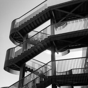 Low angle view of modern staircase  against sky 