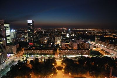 Illuminated cityscape at night