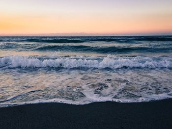 Scenic view of sea at sunset