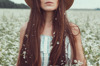 Close-up of woman with reflection in water