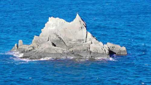 Panoramic view of sea - grey rock in the sea - tangier morocco