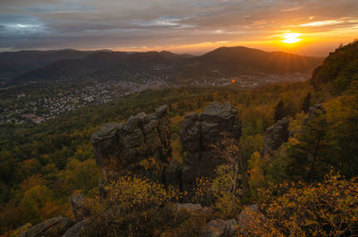 Scenic view of mountains against sky during sunset