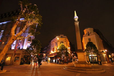 Illuminated street light at night