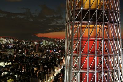 Cityscape against sky at night