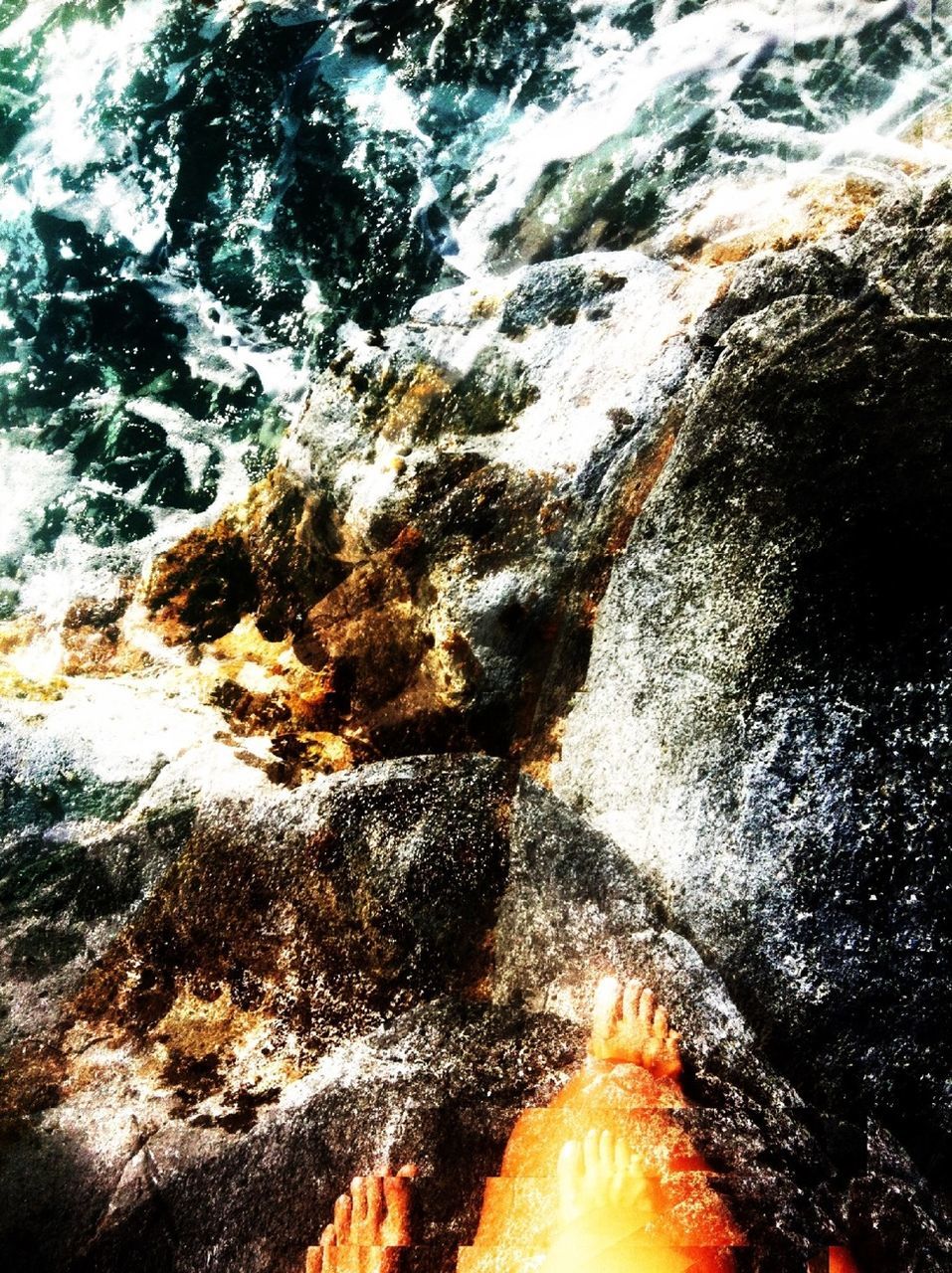 water, rock - object, nature, motion, high angle view, sunlight, beauty in nature, close-up, outdoors, heat - temperature, rock formation, no people, flowing water, textured, reflection, day, scenics, tranquility, burning, full frame