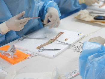 Midsection of man working at clinic