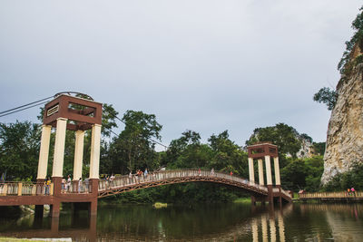 Bridge over river against sky