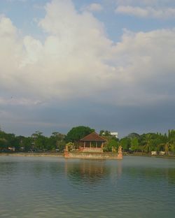 Scenic view of sea against cloudy sky