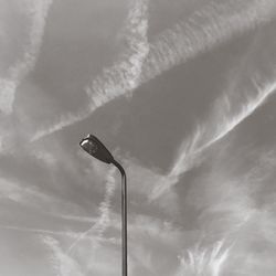 Low angle view of street light against sky