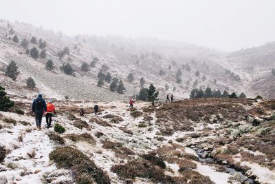 Tourists on rock formation