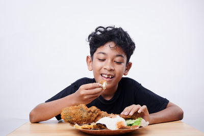 Young woman eating food