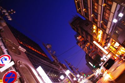 Low angle view of modern building at night