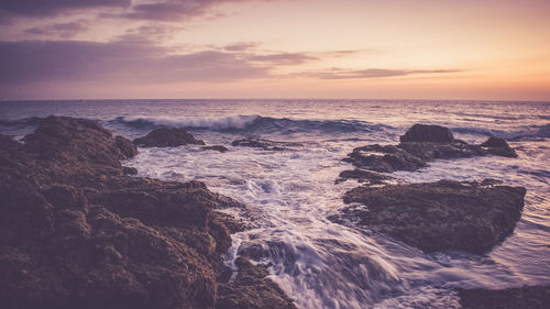 Scenic view of sea against sky during sunset