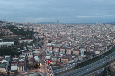 High angle view of street amidst buildings in city