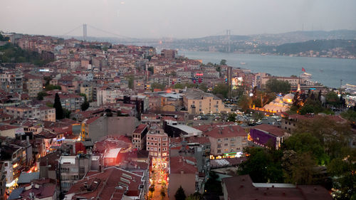 Cityscape against sky at dusk