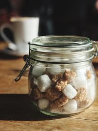 Close-up of ice cream in jar on table
