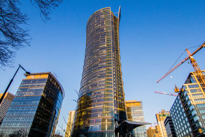 Low angle view of modern buildings against sky