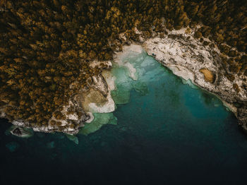 High angle view of sea and rock formation