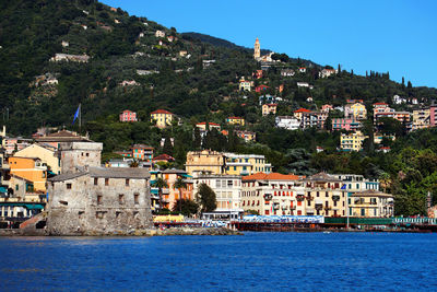 Scenic view of cinque terre by sea