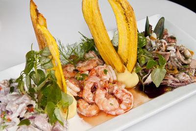 Close-up of chopped vegetables in plate