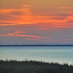 Scenic view of sunset over sea