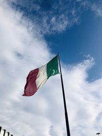 Low angle view of flag against sky